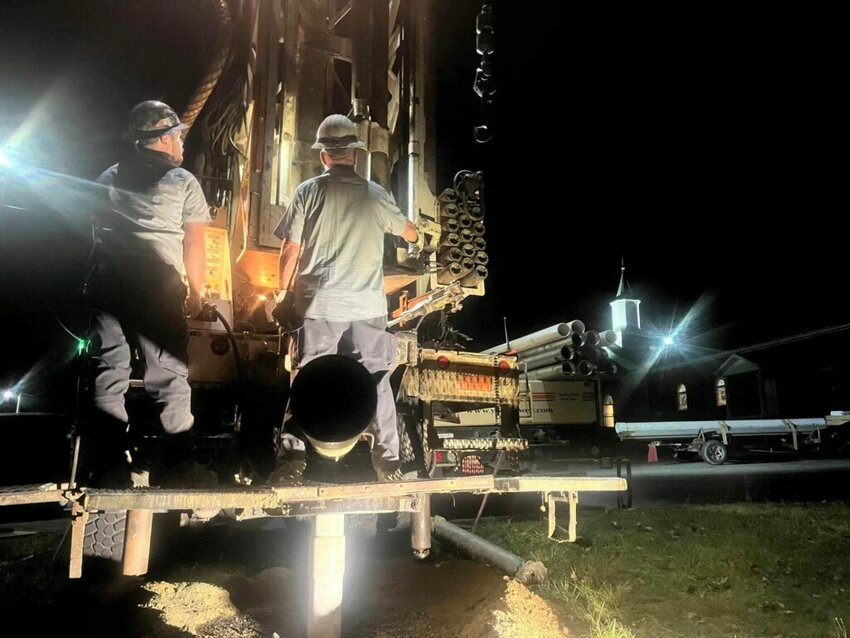 Employees of Yadkin Well Company, based in Hamptonville, N.C., drill to install the well at West Burnsville Baptist Church earlier this month. (Photo/Yadkin Well Company via Baptist Press)