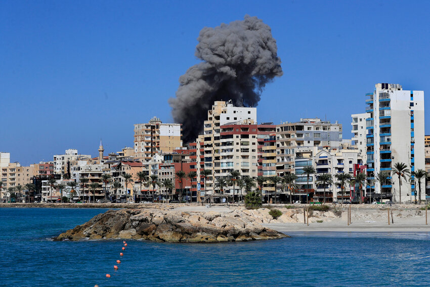 Smoke rises from buildings hit in an Israeli airstrike in Tyre, Lebanon, Wednesday, Oct. 23, 2024. (AP Photo)