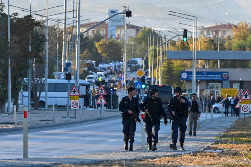 Emergency and security teams deploy outside of Turkish Aerospace Industries Inc. on the outskirts of Ankara, Turkey, Wednesday, Oct. 23, 2024. (AP Photo)