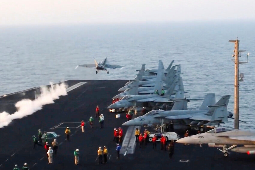 An aircraft launches from the USS Harry S. Truman in the Red Sea before airstrikes in Sanaa, Yemen, Saturday, March 15, 2025. (U.S. Navy via AP)