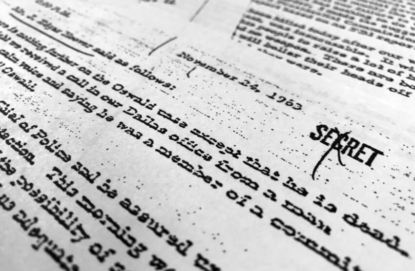Part of a file, dated Nov. 24, 1963, quoting FBI director J. Edgar Hoover as he talks about the death of Lee Harvey Oswald. (AP Photo/Jon Elswick, File)