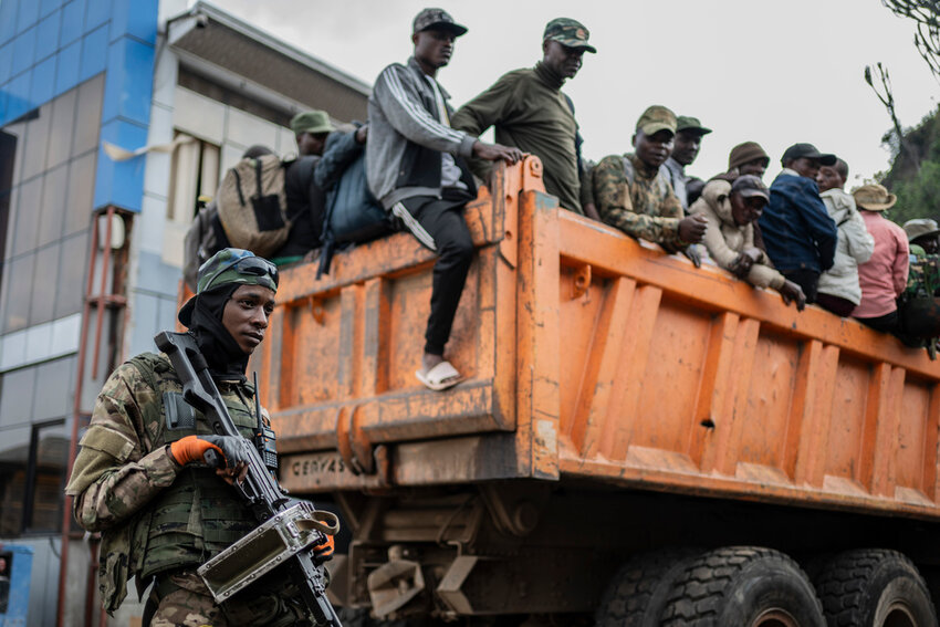 Former members of the Armed Forces of the Democratic Republic of Congo and police officers who allegedly surrendered to M23 rebels arrive in Goma, Congo, Sunday, Feb. 23, 2025. (AP Photo/Moses Sawasawa, File)
