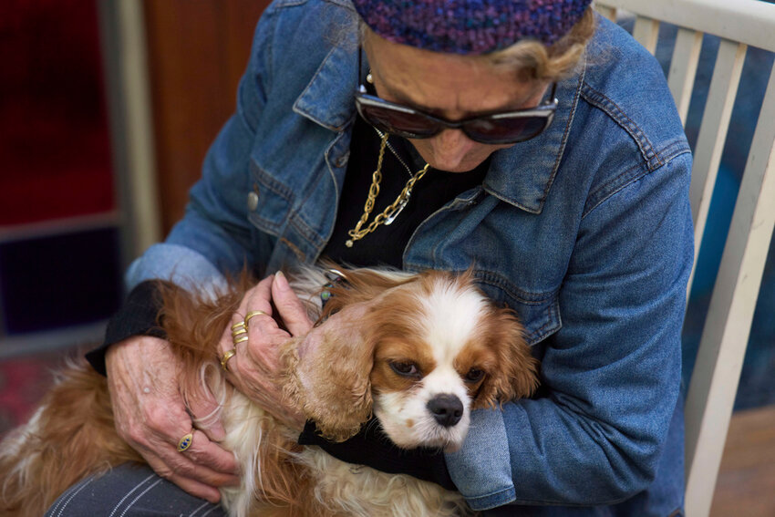 Rachel Dancyg holds her dog, Billie, on Wednesday, April 16, 2025. Israeli soldiers found Billie in the Gaza Strip, 18 months after she disappeared during Hamas' terror attack on Dancyg's Kibbutz of Nir Oz, in Binyamina, Israel. (AP Photo/Ariel Schalit)
