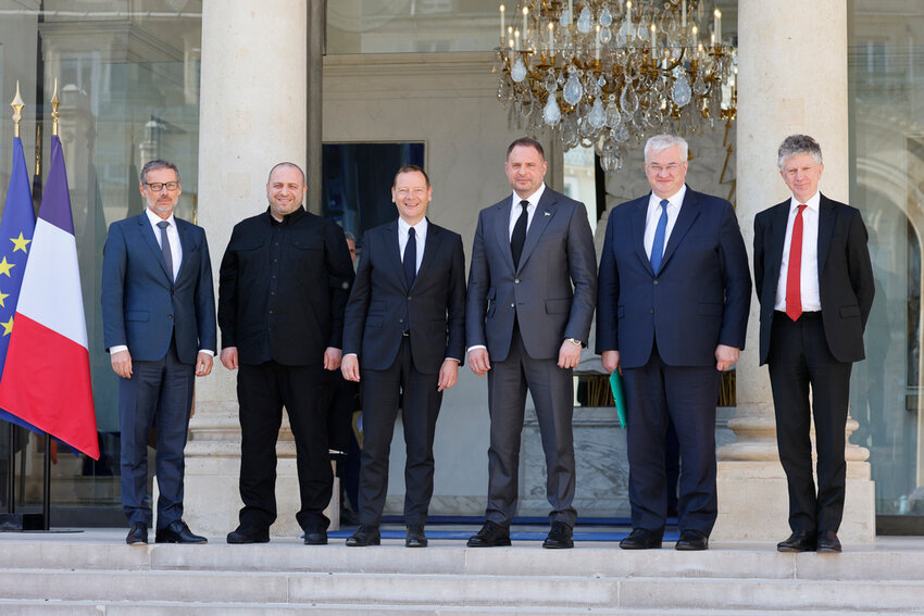 From left, Germany national security advisor Jens Plotner, Ukraine's Defence Minister Rustem Umerov, French President diplomatic advisor Emmanuel Bonne, Ukraine's President chief of staff Andriy Yermak, Ukraine's Foreign Minister Andriy Sybiga, and Britain's National Security Adviser Jonathan Powell pose as they arrive for a meeting with French President Emmanuel Macron at the Elysee Palace in Paris, Thursday, April 17, 2025. (Ludovic Marin, Pool Photo via AP)
