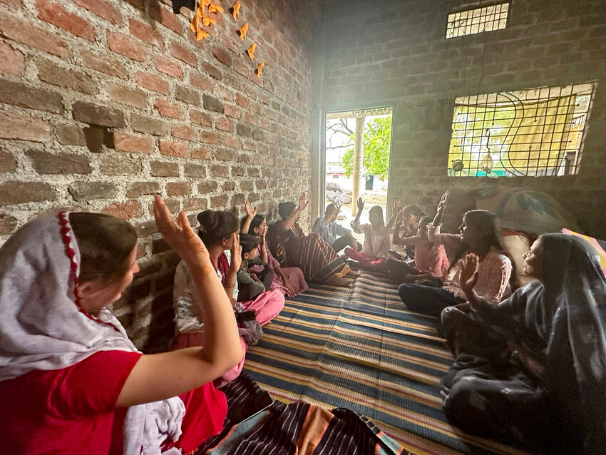 Women gather to study the Bible. At one point, this village only had a time of learning for men. When two sisters asked for a Bible from IMB missionaries, a women’s study soon began. (Photo/IMB)