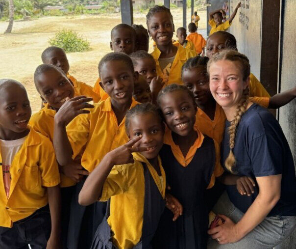 Hannah Lasley poses for a photo with students during a recent vision trip to Liberia, West Africa. (Photo/via Arkansas Baptist News)