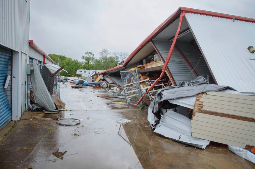 Debris covers the ground after severe storms passed the area in Ada, Okla., on Sunday, April 20, 2025. (Richard R. Barron/The ADA News via AP)