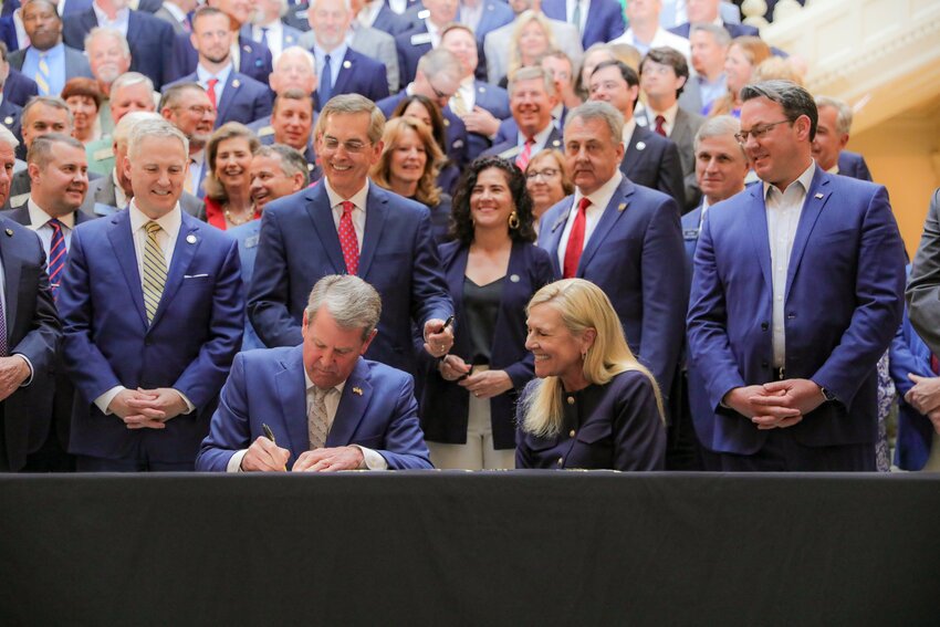 Gov. Brian Kemp signs tort reform legislation at the Capitol on Monday, April 21, 2025. (Photo/Office of the Governor)