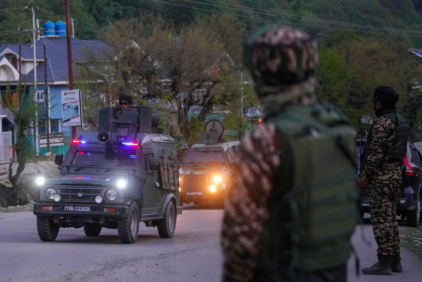 Indian security officers patrol in armored vehicles near Pahalgam in south Kashmir after assailants indiscriminately opened fired at tourists in Pahalgam, Indian controlled Kashmir, Tuesday, April 22, 2025. (AP Photo/Dar Yasin)