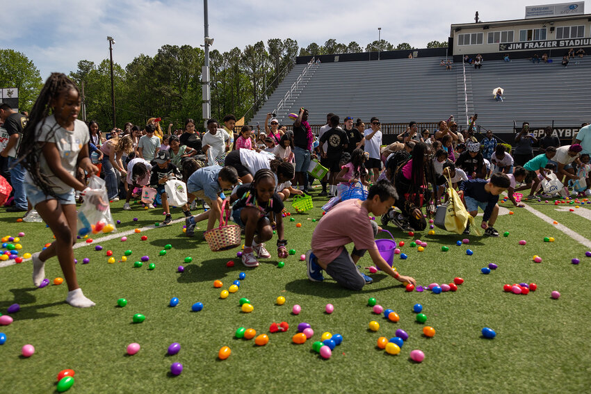 Kids gather eggs at Sprayberry High School on April 19, 2025. (Photo/courtesy Piedmont Church)