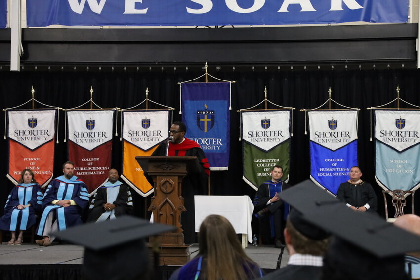 Dr. Eric Holland, Superintendent of Rome City Schools, delivers the keynote address at Shorter University’s 2025 Hooding Ceremony, inspiring graduates to lead with integrity and serve their communities. (Photo/Shorter University)