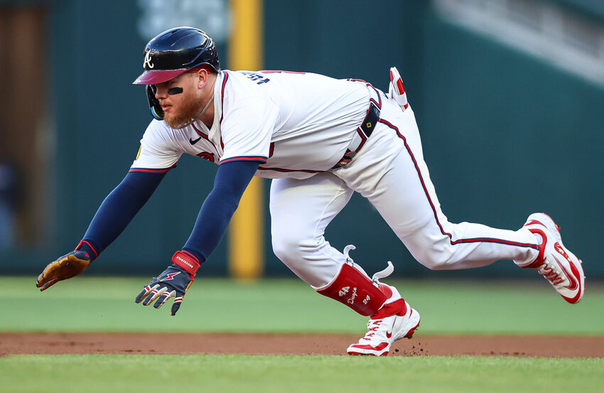 Atlanta Braves' Alex Verdugo slides into second base after a leadoff double in the first inning against the Washington Nationals, Monday, May 12, 2025, in Atlanta. (AP Photo/Colin Hubbard)