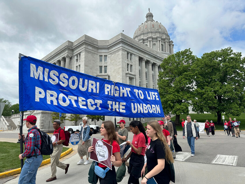 Participants in the Midwest March for Life walk past the Missouri Capitol on May 1, 2025, in Jefferson City, Mo. (AP Photo/David A. Lieb, File)