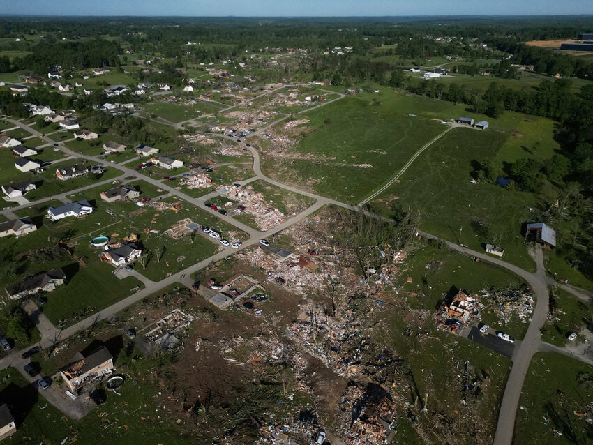 Debris from destroyed homes litters the area, Sunday, May 18, 2025, in London, Ky., after a severe storm passed through the area. (AP Photo/Carolyn Kaster)