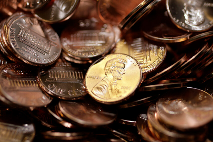 Freshly-made pennies sit in a bin at the U.S. Mint in Denver in 2007. (AP Photo/David Zalubowski, File)