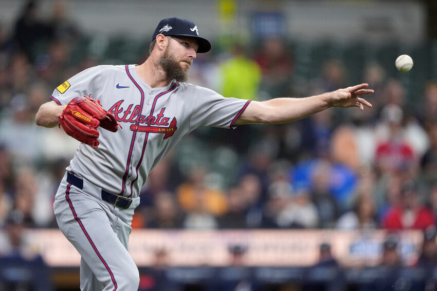 Atlanta Braves' Chris Sale throws to first base during the first inning against the Milwaukee Brewers, Monday, June 9, 2025, in Milwaukee. (AP Photo/Aaron Gash)