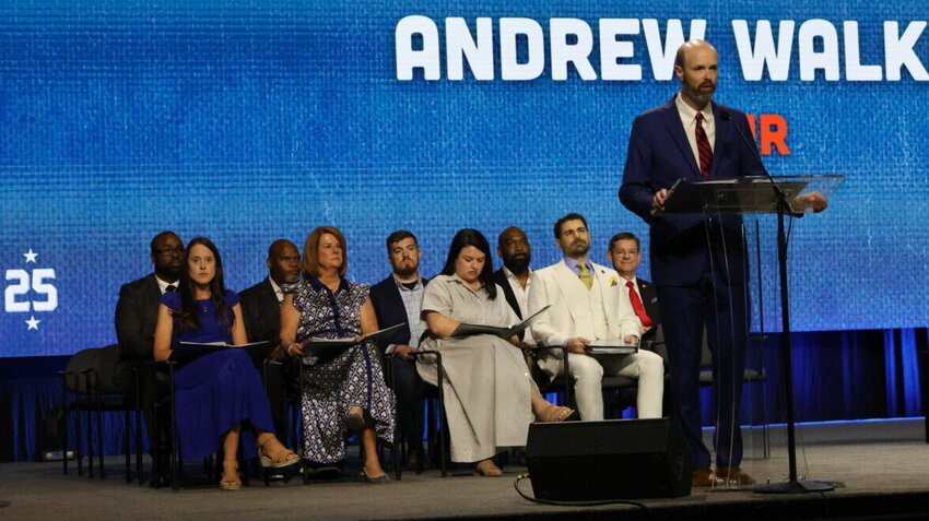 Andrew Walker, chair of the Committee on Resolutions, gives the committee report during the 2025 Southern Baptist Convention annual meeting in Dallas. (The Baptist Paper/Van Payne)
