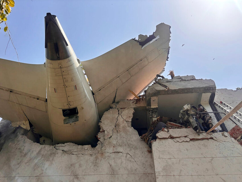 The tail of a plane that crashed in the northwestern Indian city of Ahmedabad, in Gujarat state, Thursday, June 12, 2025. (CISF via AP)
