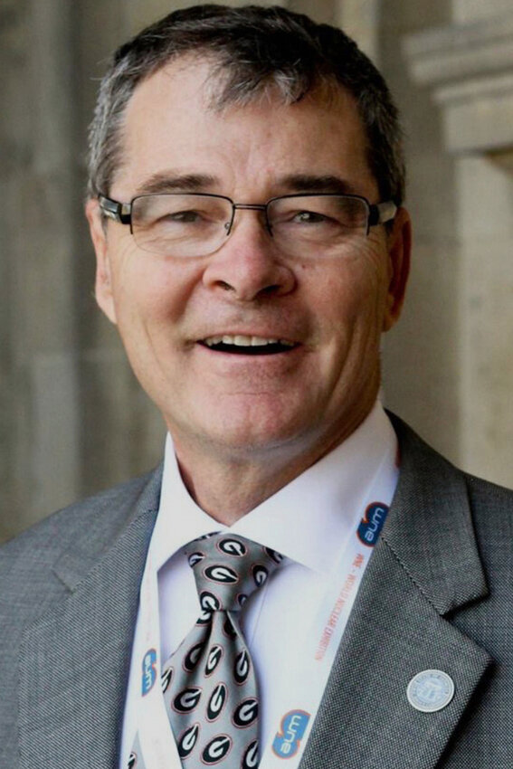 This undated photo provided by Bonnie Echols shows Georgia Public Service Commissioner Tim Echols, a Republican. (Bonnie Echols via AP)
