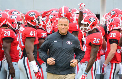 Georgia head coach Mark Richt runs onto the field before the game between the Georgia Bulldogs and the Southern University Jaguars in Athens, Ga., on Saturday, Sept. 26, 2015.  Photo by Stephen Colquitt/georgiadogs.com