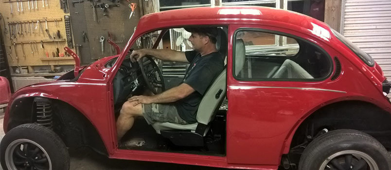 John Albrycht sits in the 1974 Volkswagen Super Beetle restored by himself and a collection of others, including students from Georgia College in Milledgeville. Albrycht directs a ministry, Bugs 4 Christ, that rebuilds cars for young men and women in need. BUGS4CHRIST/Special