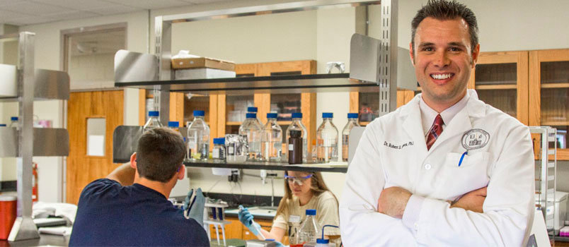 Dr. Robert S. Bowen, Dean of STEM and Associate Professor of Physiology stands in the TMU biology lab. TMU/Special