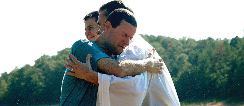 A man expresses gratefulness, in this file photo, to a pastor of Blackshear Place Baptist Church who baptized him in Lake Lanier after an evangelism emphasis. The Flowery Branch church has grown due to its evangelism emphasis, reversing the national trend of sharply declining baptisms. BLACKSHEAR PLACE CHURCH/Special