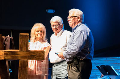 Sandra McKown retired on June 11 after 60 years of service as organist at Beulah Baptist Church in Douglasville. Pictured are the anniversary recognition are, left to right, Sandra and her husband, Donald and Worship and Operations Pastor Terry Pearman. BBC/Special