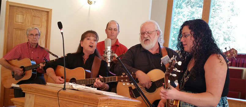The Lord's Messengers, a local acoustic bluegrass band, sings in the eclipse at Wolffork Baptist Church in Rabun Gap this morning. The church is inviting visitors in town for the total eclipse to the special worship service and hot dogs and hamburgers after the service.  RON LAWSON/ Special