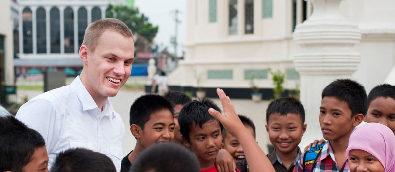 In this file photo from shortly before he was elected IMB president in August 2014, David Platt interacts with schoolchildren in Indonesia. Platt, then 36, has had a tumultuous three-year presidency beset with a financial crisis which demanded a "reset" of the agency's missionary sending policy and substantial staff reductions. But that corner has now been turned and the agency is back on solid ground, Georgia trustees agree. IMB photo
