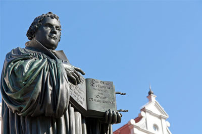 A statue of Martin Luther stands in Wittenberg, Germany, one of the major players of the Reformation. GETTY IMAGES