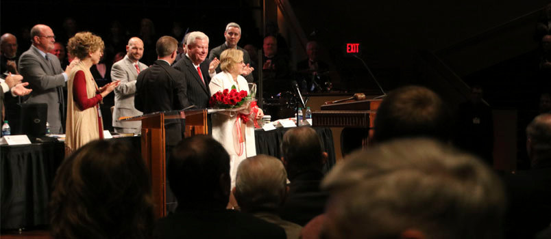 Georgia Baptist Executive Director J. Robert White expresses thanks alongside his wife, Janice, to those gathered at the annual meeting following a string of congratulatory videos and testimonies on White's 25 years in his position. SCOTT BARKLEY/Index