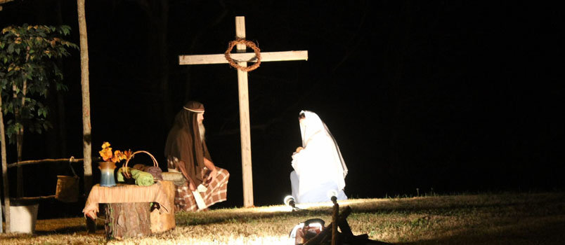 In this archive photo from the 2015 production, Mary and Joseph and Baby Jesus kneel before the cross at the conclusion of the performance. Choir Director Jami Hall says the "Journey to Bethlehem will focus on the idea that Jesus was born to die on the cross for humanity.  JAMI WALL/Special