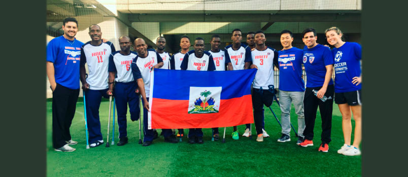 The men in the white t-shirts are members of the Haiti Amputee Soccer Team pictured in Atlanta on their goodwill tour in the U.S.
