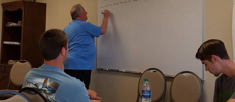 Fred Evers, pastor of Tifton’s Northside Baptist Church, mentors young men, equipping them for the ministry. Each Wednesday morning he teaches his students how to take a passage of scripture and develop it into a sermon.