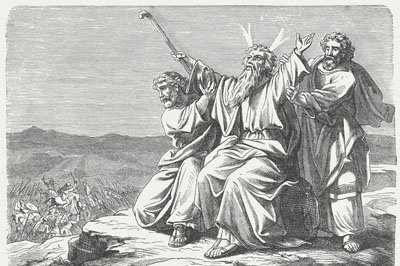 "So Joshua fought against Amalek just as Moses had instructed him; and Moses and Aaron and Hur went up to the top of the hill. Whenever Moses would raise his hands, then Israel prevailed, but whenever he would rest his hands, then Amalek prevailed." Woodcut after a drawing by Julius Schnorr von Carolsfeld (German painter, 1794 - 1872)