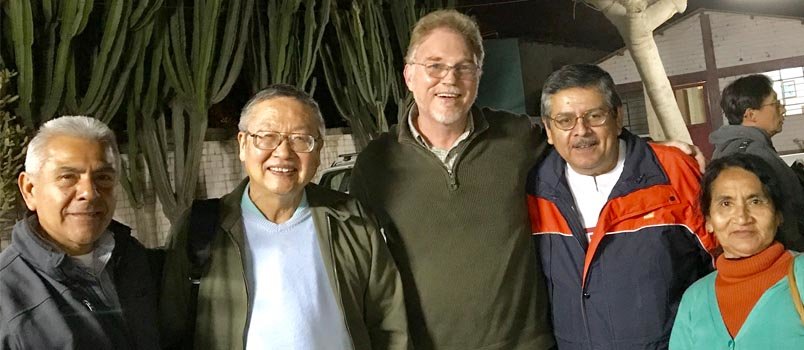 IMB Lima City Team Leader Joe Busching, center, stands with Jerry Jean, (second from left), pastor of Emmanuel Baptist Church in Kansas City, and an unidentified pastor, far left, who has opened his church to plant the first Chinese Baptist Church in the Peruvian city. Busching, with his wife Kim, not pictured, are from Wildwood Baptist Church in Acworth. IMB/BEN LIN