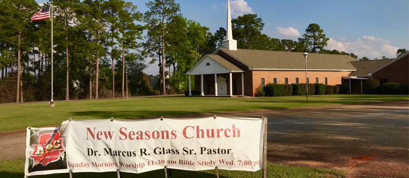 A sign outside Raleigh White Baptist Church announces the growing African American congregation which has shared its facilities for the past three years.  JOE WESTBURY/Index