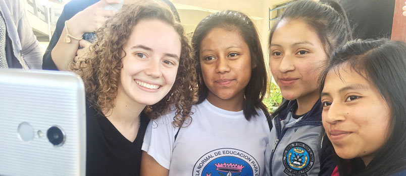 Hannah Dailey, left, takes a selfie with some of her newfound Middle School students at a public school in Guatemala. HANNAH DAILEY/Special