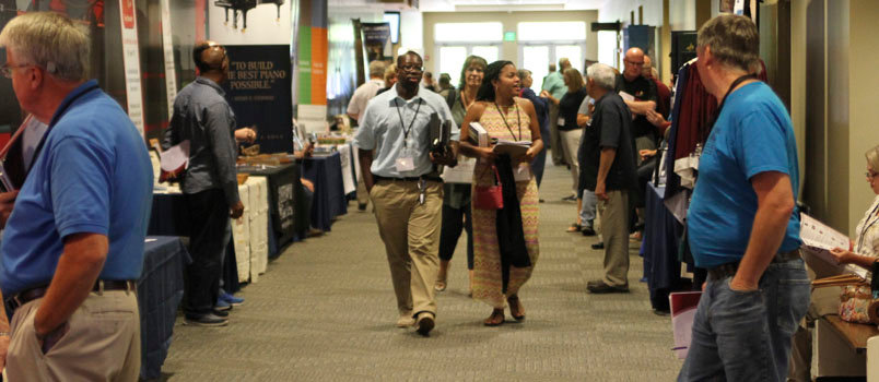 Attendees at GO Georgia 2016, held last year at Prince Avenue Baptist Church in Bogart, peruse the displays in a hallway. This year's GO Georgia will be held in two locations, Aug. 18-19 at Roswell Street Baptist Church in Marietta and Aug. 25-26 at First Baptist TiftoN. GBC COMMUNICATIONS/Special