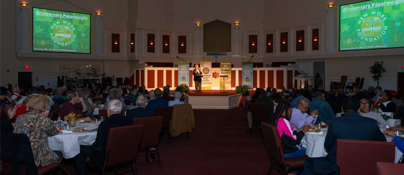 The sanctuary of Emmanuel Community Church in Conyers served as the banquet hall for recognizing the New Work Foundation's 30th anniversary on March 22. Emmanuel is one of 59 churches that have been resourced by the Foundation since its inception. DAVID FEREBEE/Special