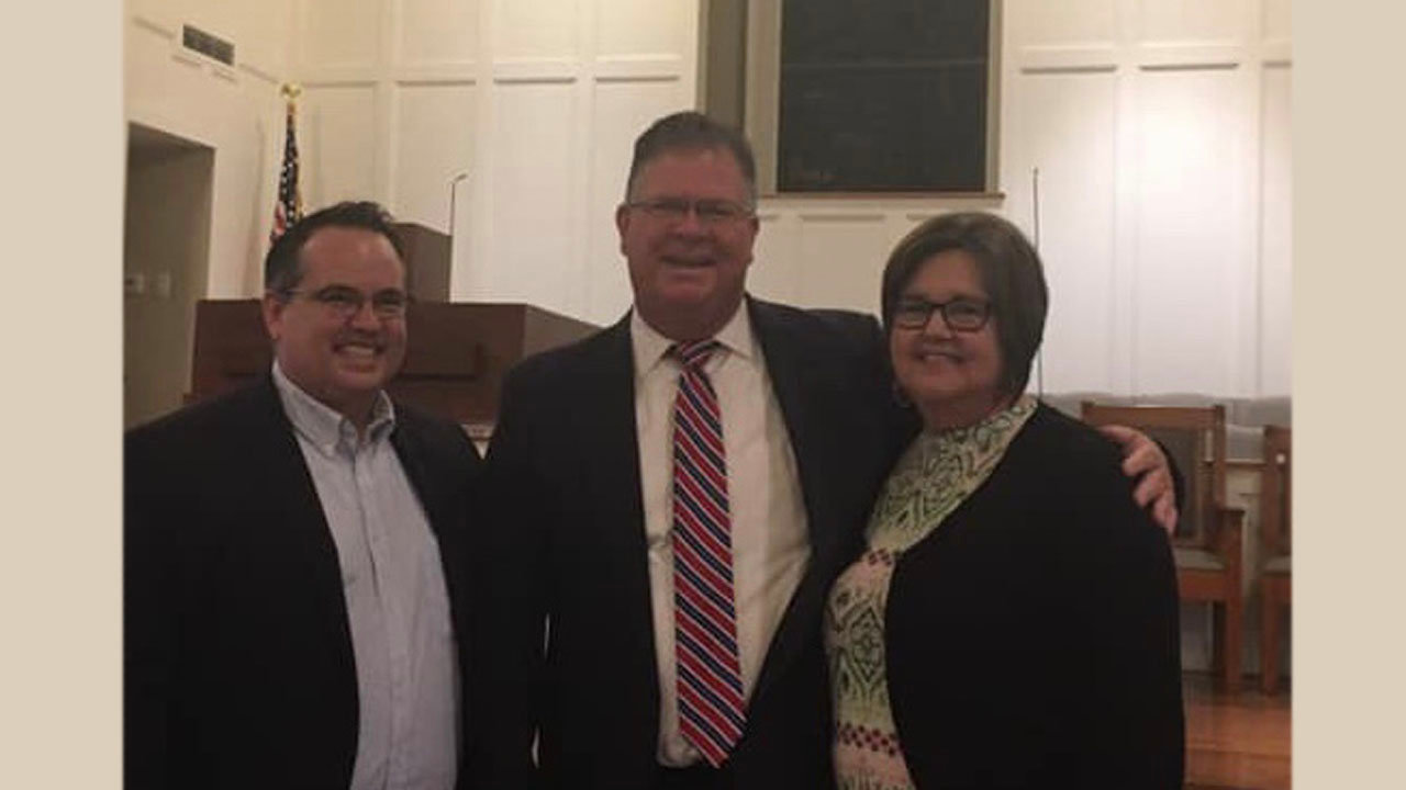 Pastor Paul Fulton, Rob Hobby, and V-Ann Hobby