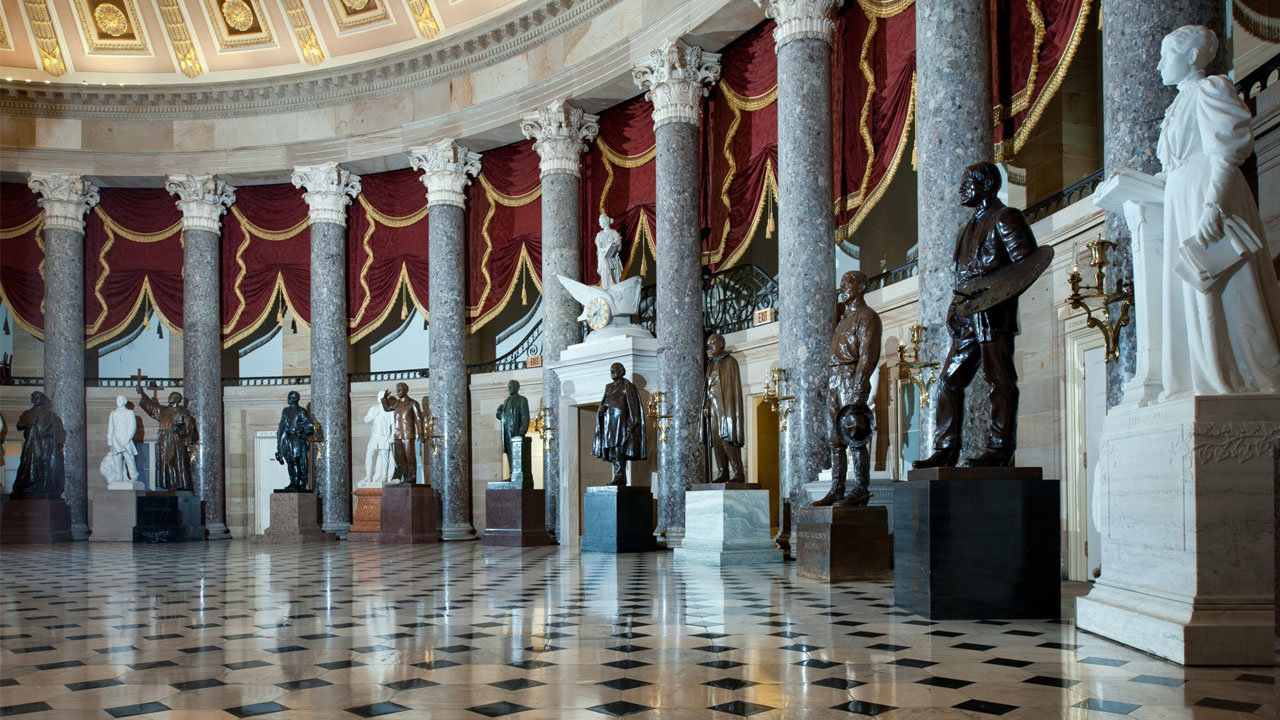 Statues of famous Americans line the rotunda of the U.S. Capitol. RNS/AP