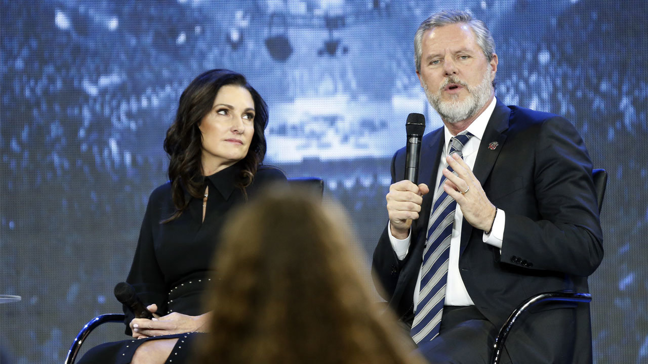 Jerry Falwell Jr., right, answers a student’s question, along with his wife, Becky, during a town hall on the opioid crisis at a convocation at Liberty University in Lynchburg, Va., on Nov. 28, 2018. STEVE HELBER/AP