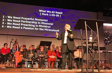 Tommy Fountain, Sr. preaches on the first Sunday in the new worship center – formerly a Piggly Wiggly grocery store. GBC/Special