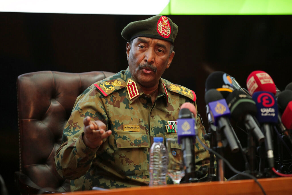 Sudan's head of the military, Gen. Abdel-Fattah Burhan, speaks during a press conference at the General Command of the Armed Forces in Khartoum, Sudan, Tuesday, Oct. 26, 2021. The U.N.’s top human rights body is holding an urgent session about Sudan on Friday, Nov. 5, 2021, after a military coup there nearly two weeks ago, with Britain, the United States, Germany and Norway leading a push to commission an expert to monitor the situation. The push for a human rights expert comes amid mounting pressure on Gen. Abdel-Fattah Burhan, and the forces loyal to him who dissolved Sudan’s transitional government and detained other government officials and political leaders in the Oct. 25 coup. (AP Photo/Marwan Ali, file)