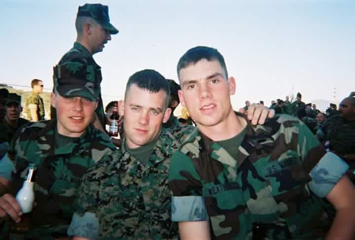 Daniel Weathers, right, pauses at Camp Lejeune in 2002 with fellow platoon members David Tavenner of Virginia, left, and Corey Vendetti of Oklahoma, center.