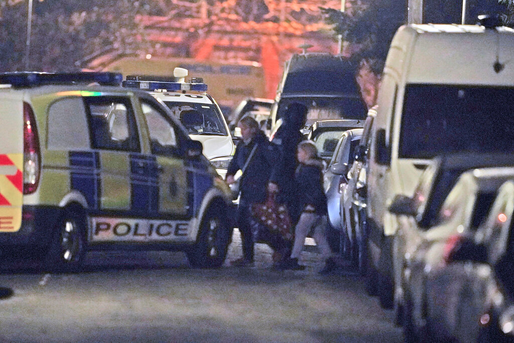 Armed police evacuate local residents during an incident an address in Rutland Avenue in Sefton Park, after an explosion at Liverpool Women's Hospital killed one person and injured another. Three men have been arrested under the Terrorism Act. Picture date: Sunday November 14, 2021. PA Photo. Merseyside Police were called to reports of a blast involving a vehicle, believed to be a taxi, at Liverpool Women's Hospital at 10.59am on Sunday. Counter Terrorism Police North West said three men, aged 29, 26, and 21 were detained in the Kensington area of the city and arrested under the Terrorism Act in connection with the incident. See PA story POLICE Hospital. Photo credit should read: Peter Byrne/PA Wire