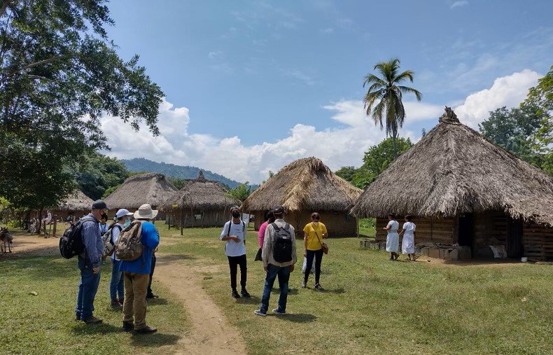 Participants who took part in a vision trip to South America visit a local village.