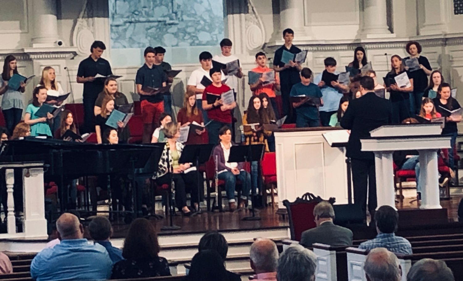 The student choir performs at First Baptist Church in Newman, Georgia. The choir plays an integral part in the life of the congregation.